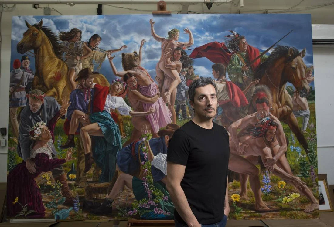 Kent Monkman with painting; editor-supplied reference image